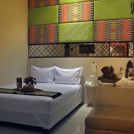 Hôtel Metro House à Sorabaya Chambre photo